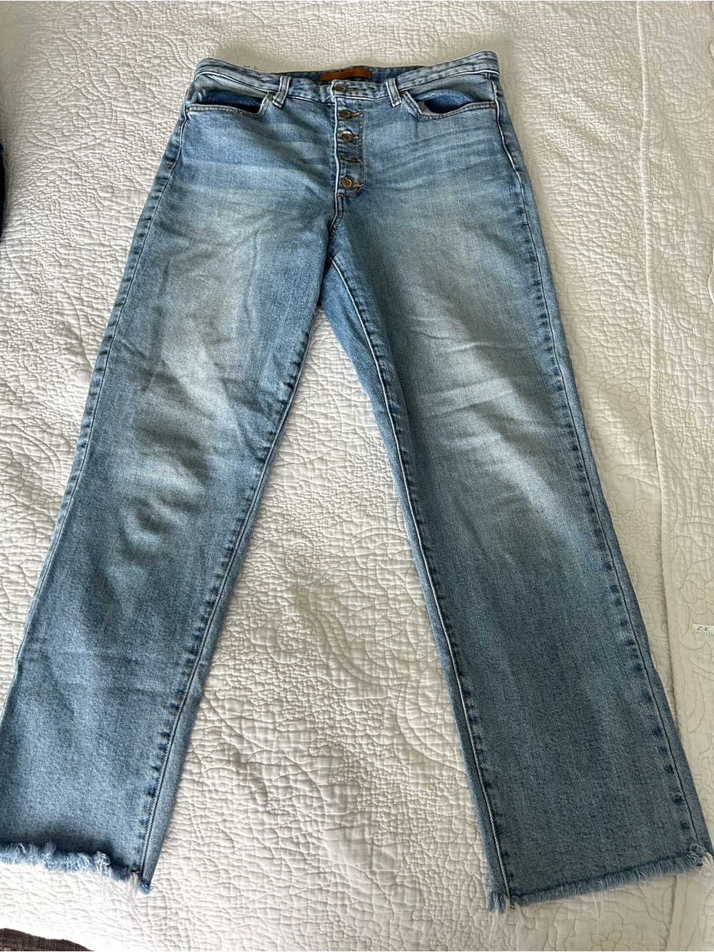 Light Blue Denim Jeans with Button-Fly Detail